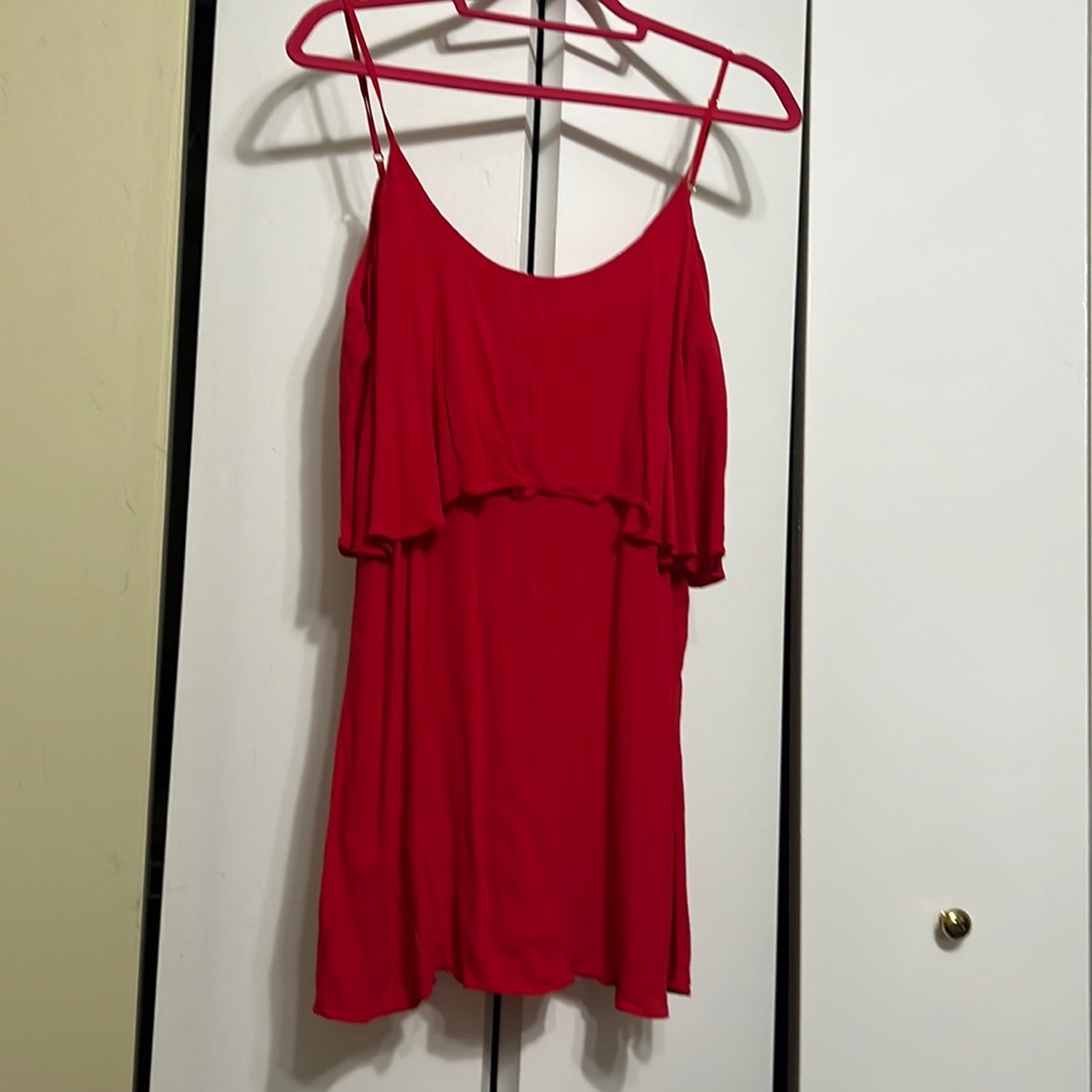 Light flowy red blouse with one layer just over the chest area